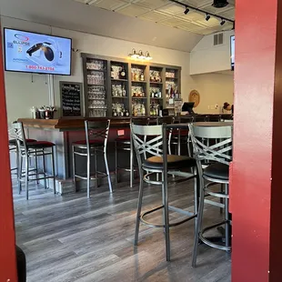 a bar with a television in the background