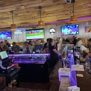 people sitting at the bar