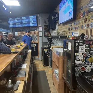 customers sitting at the bar