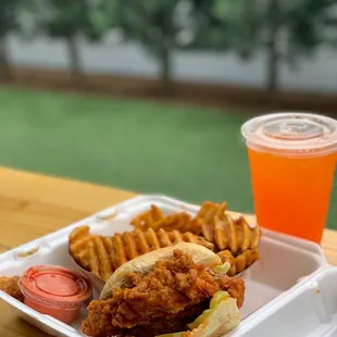 a chicken sandwich and waffle fries