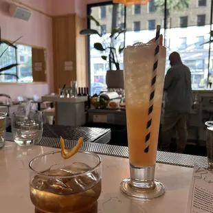 a glass of iced tea and a glass of iced tea