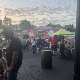 a crowd of people sitting at tables