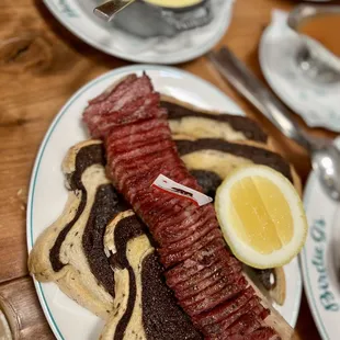 Corned Beef Short Rib feast, cheezzzzy aligot potatoes in the background