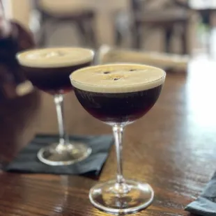 two cocktails on a table