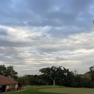 View from dining room: practice green, first tee, Hoover Tower in distance
