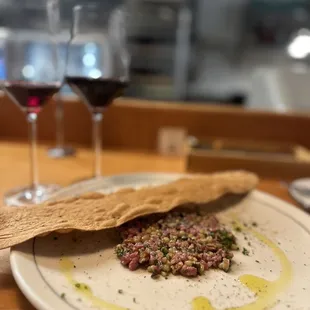 a plate of food and wine