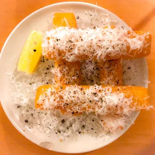 Panisse, crushed black pepper, and pecorino.