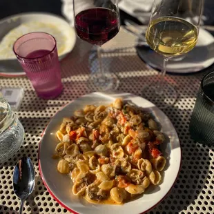 Another pasta with some sort of creamy tomato sauce, sausage, peppers. Dreamy