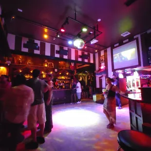 a group of people at a bar