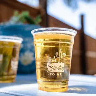 two cups of beer on a table