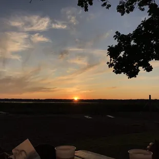 the setting of a sunset