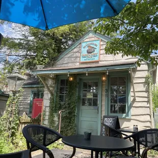 Entrance and patio seating.
