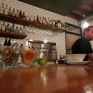 a man sitting at a bar
