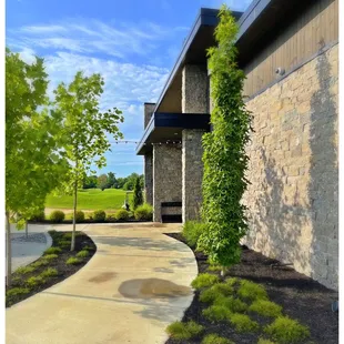 a walkway in front of a building