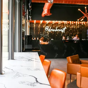 a view of the bar and seating area