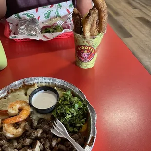 Papa Increible and chicharron, Aguas Frescas limónada.