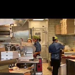 two workers in a kitchen