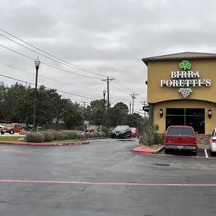 a parking lot with parked cars