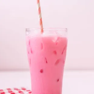 a drink in a glass with a straw