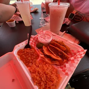 Quesataco plate with strawberry horchata on the side