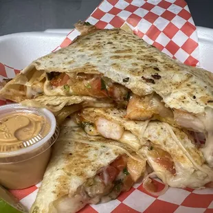 Supreme Quesadilla. Grilled
Shrimp and cooked pico with cheese In a flour tortilla that we make nice and toasty