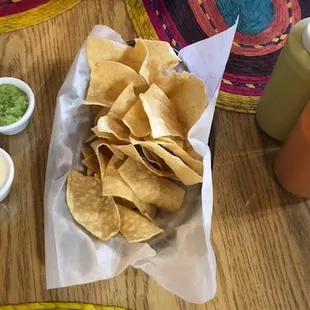 The bright green cup of salsa was a tomatillo. The red on the right was tomato based and the green jalapeno. These were all delicious!