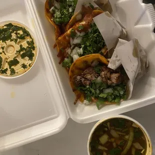 a meal in a styrofoam container