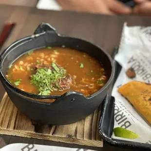 Birria Ramen served with a taco