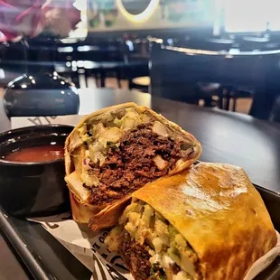 California Birria Burrito with consomme.