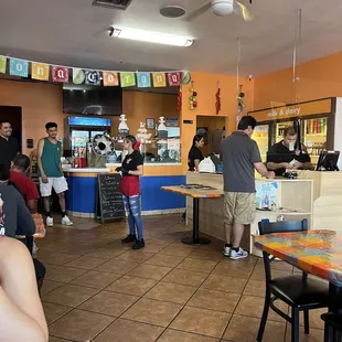 a group of people in a restaurant