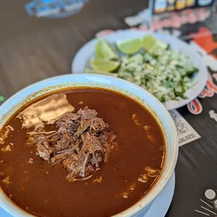 $12.75 Birra Ramen. Comes with onions, cilantro, lime.