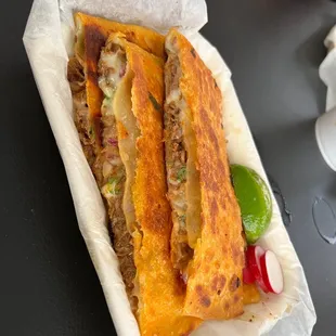 Birria Quesadilla you get full easily and it taste so good. Get the consome