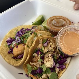 Skimpy shrimp taco and bland chicken taco