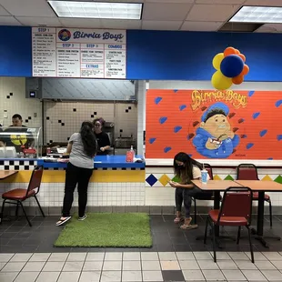 two people in a restaurant