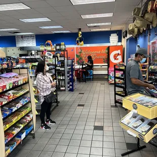 a man and a woman in a grocery store