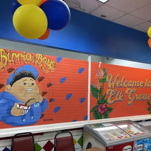 a boy holding a cup of coffee