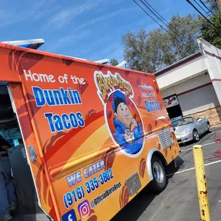 a delivery truck parked in a parking lot