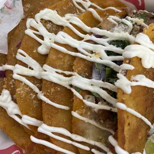 3 birria tacos with everything