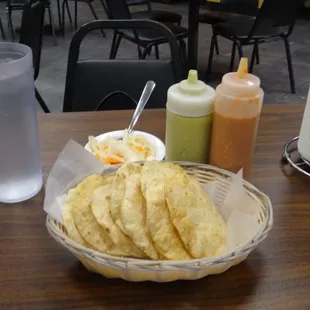 Premeal fix'ins! Chips (Tosada's) Salsa's and Onion something