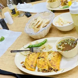 Birria tacos with consomé