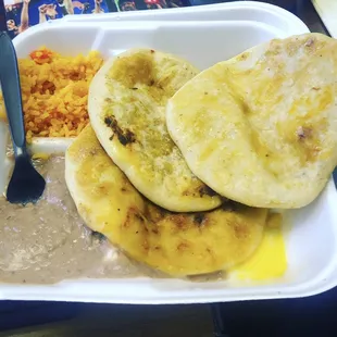 Pupusas, rice and beans.