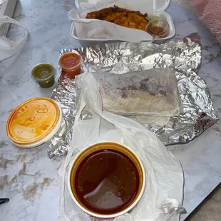 Quesa birria + breakfast burrito + side of birria