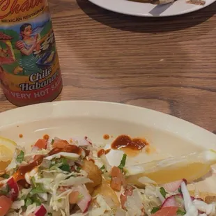 Tacos de pescado and birria de chavo