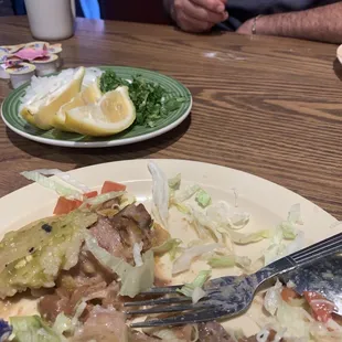 My boyfriend waiting for his order to be fixed. I had to eat my food it was getting cold after 10 minute wait.