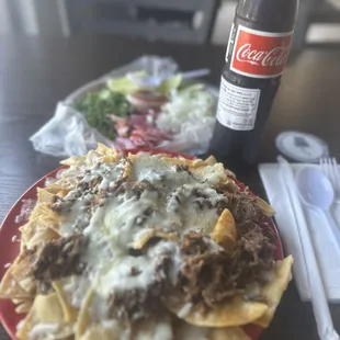 Birria Nachos and a side of Coke