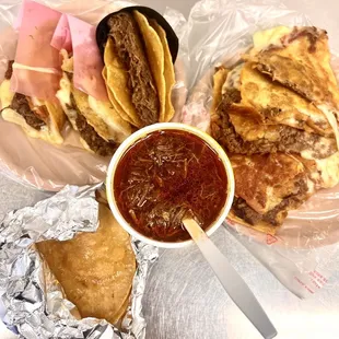 a view of a plate of quesadilla, a sandwich, and