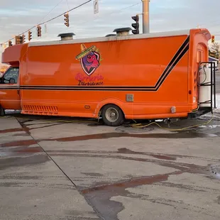 an orange food truck