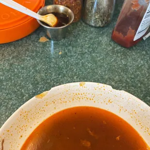 Birria in chipped bowl.