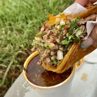 Quesabirria taco with consommé