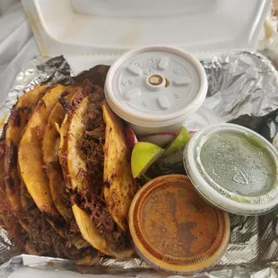 4 qeso birra tacos with salas and consome, and onion n Cilantro on the side